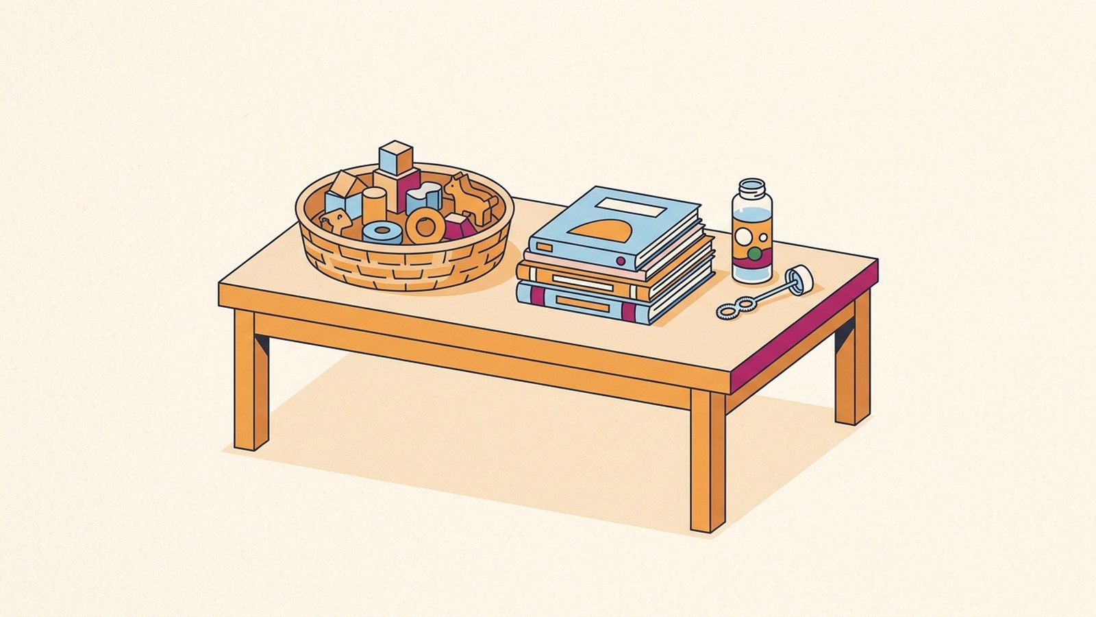A basket of small toys, a stack of picture books and a set of bubbles on a low table